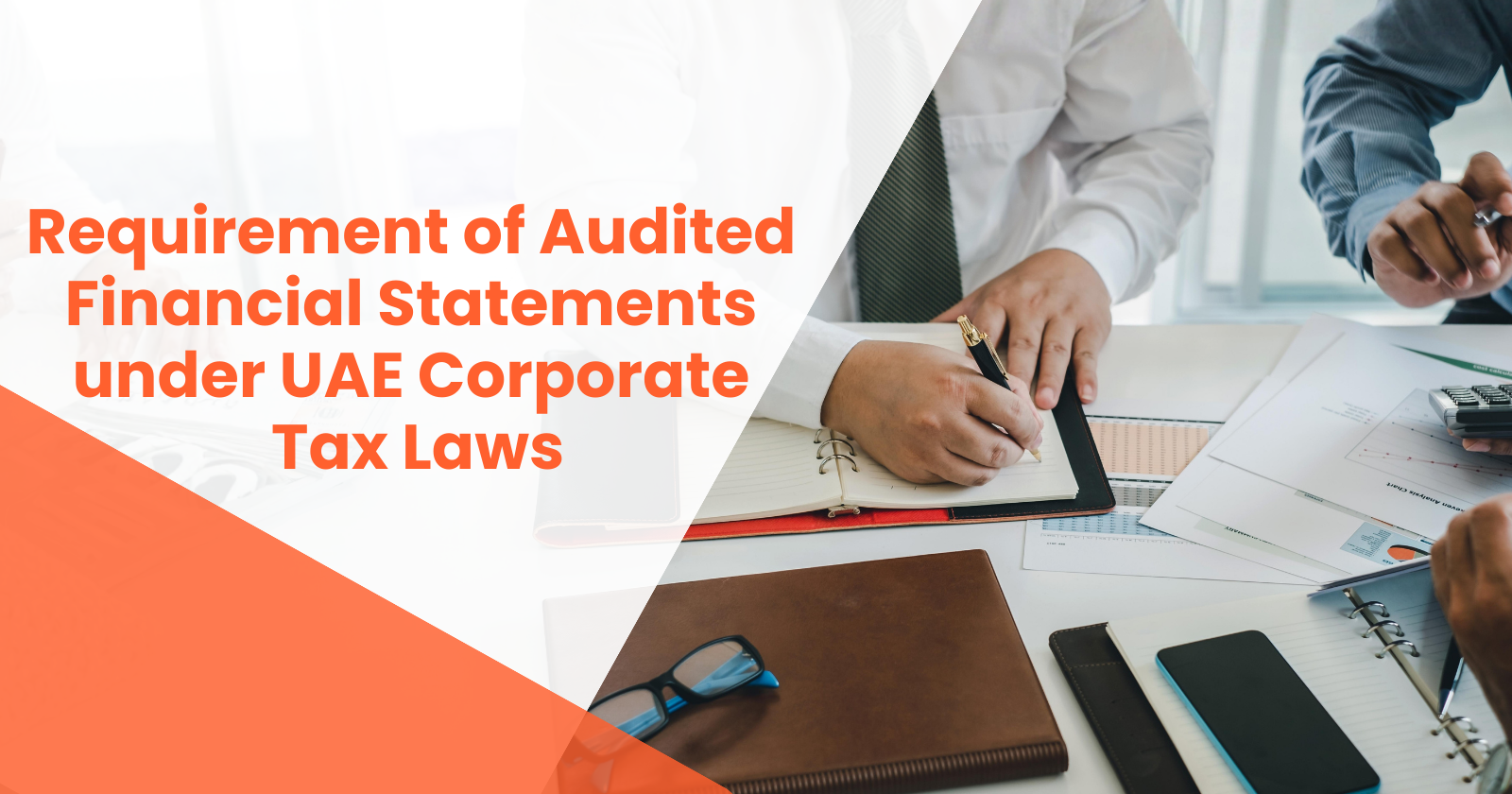 Magnifying glass over financial documents, symbolizing audited financial statements and tax compliance.